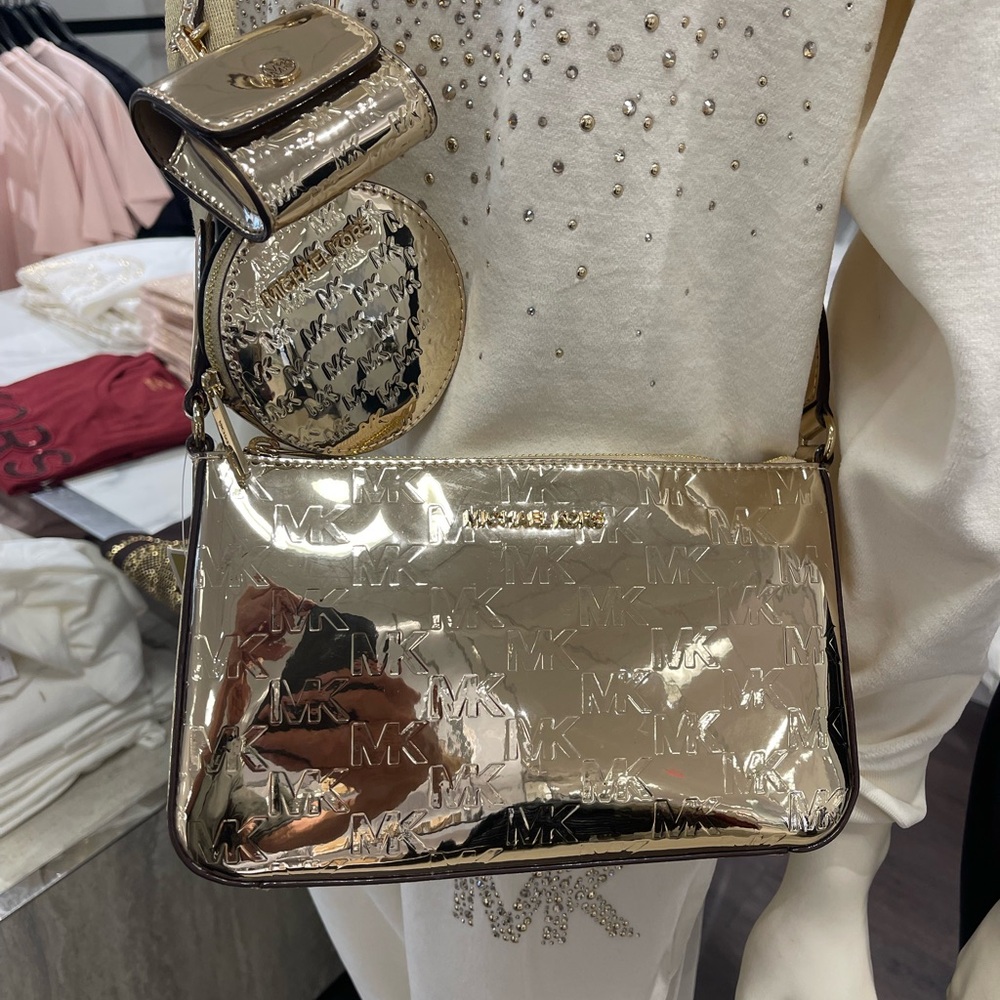 MICHAEL KORS Jet Set Sm Patent Logo Debossed Crossbody Apple Airpods
XBody Tech - Picture 8 of 12
